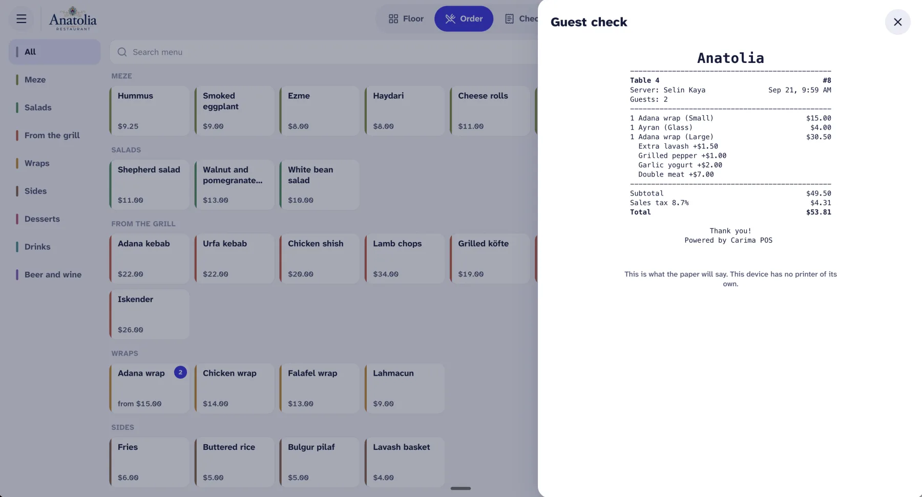 Guest check preview listing items, extras, sales tax and the total