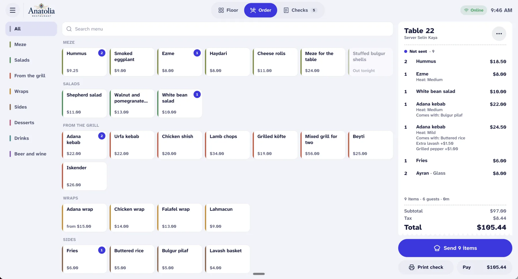 Order screen with menu categories, item tiles and the check for table 22